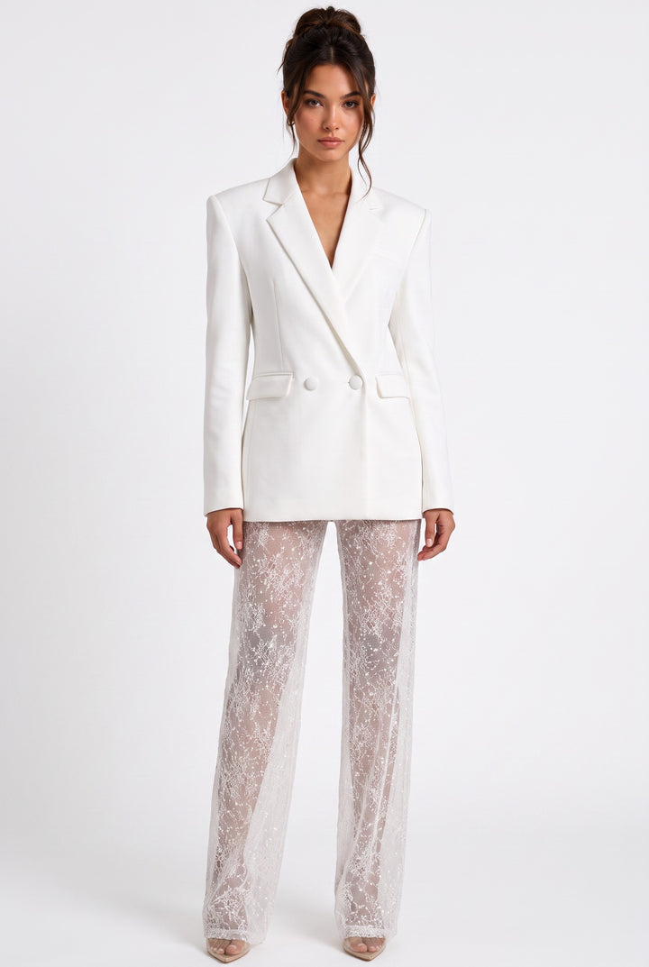 lily ivory double-breasted blazer paired with high-waisted sheer lace wide-leg trousers on a model