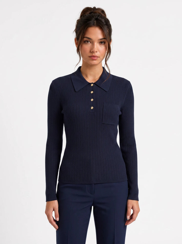lily Nina navy blue cable knit polo top with gold buttons worn by a model against a white background