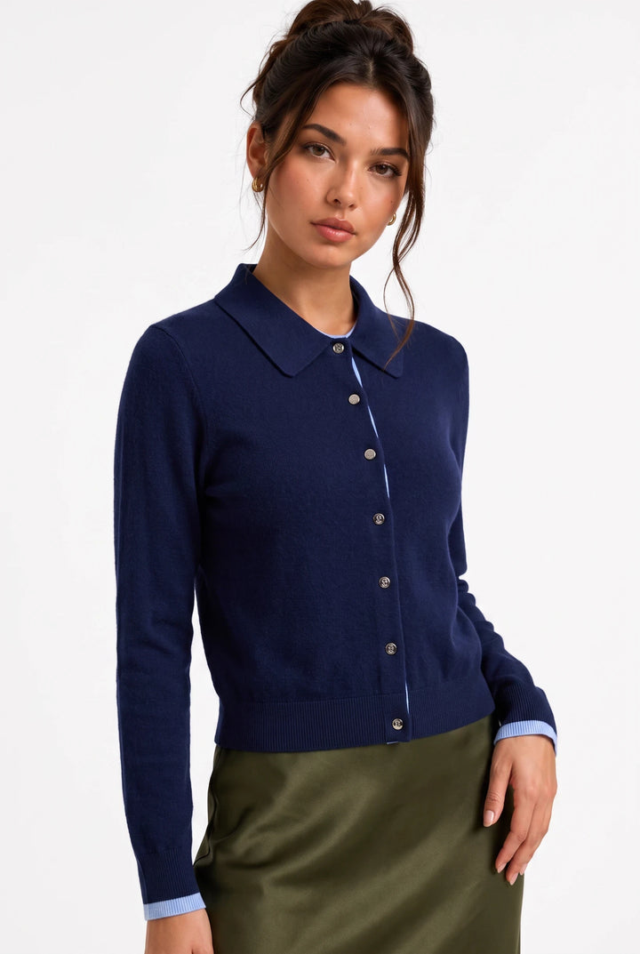 lily Sophie navy wool-blend polo knit top with button placket, long sleeves, and light blue contrast inner cuffs.
